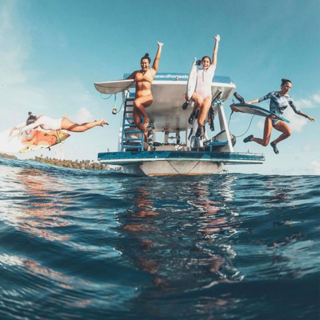 Maldives yoga retreat liveaboard safari boat dhinasha surf jumping picture